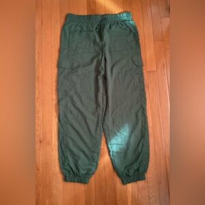 Dark green parachute pants